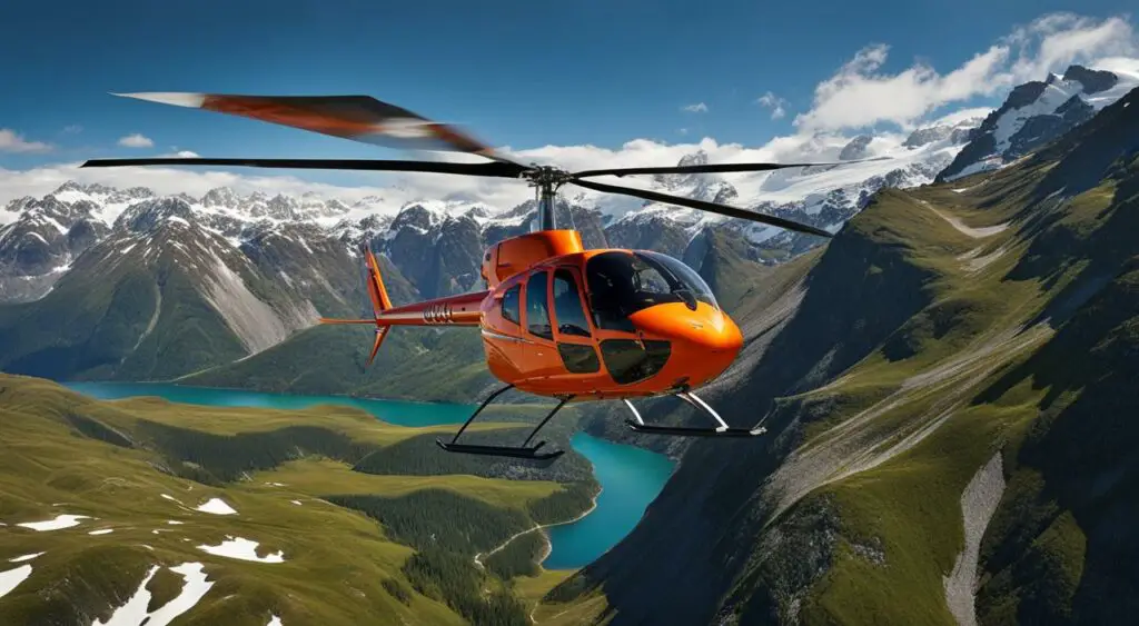 Robinson R22 helicopter flying over mountains